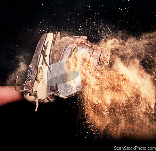 Image of Baseball, game glove and dirt studio background for catch action in sports match. Isolated leather softball athlete equipment for score in tournament with black wall for mock up.