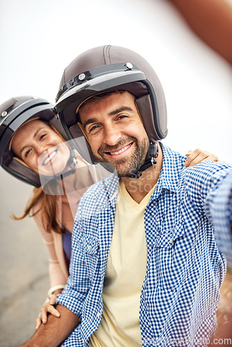 Image of Couple, helmet and selfie on road trip, smile and adventure or holiday, romance and memories. Happy people, freedom and outdoors or travel, joy and love for social media, portrait and vacation