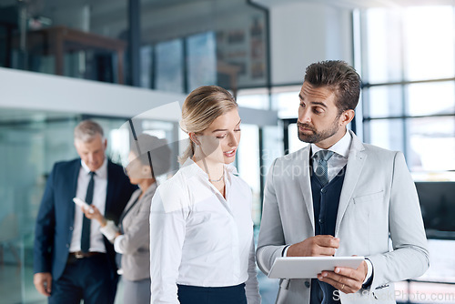 Image of Teamwork, solution or business people with tablet planning or meeting for an online project strategy. Digital research, data analysis or workers working on problem solving, technology or talking