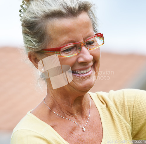 Image of Senior, happy woman and smile on face in outdoors, backyard or garden for peace, calm or relaxing in retirement. Elderly person, grandmother and glasses for vision, health or wellness by care at home