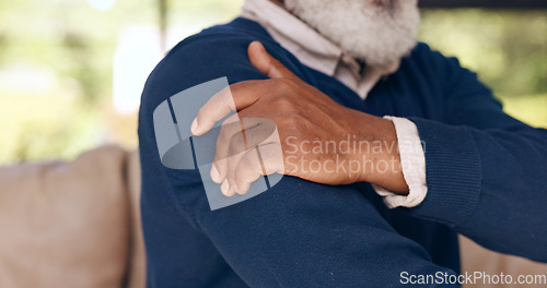 Image of Senior man, hands and shoulder with pain in home from arthritis, osteoporosis and tired joints, muscle and medical emergency. Closeup, elderly and help for arm injury, fibromyalgia or healthcare risk