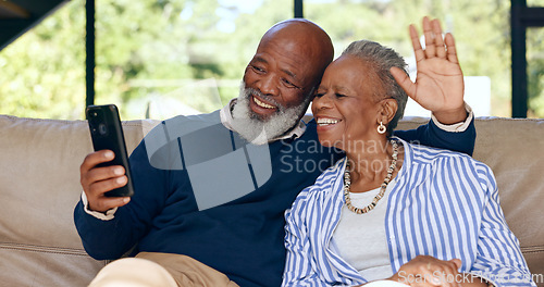 Image of Video call, happy senior couple and phone in home for voip communication, social network or chat. African man, woman or wave hello on smartphone in virtual conversation, contact or talk in retirement