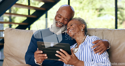 Image of Tablet, hug and senior couple on a sofa for web communication, network or chat at home. Digital, app and old people embrace in living room with love, social media or streaming subscription in a house