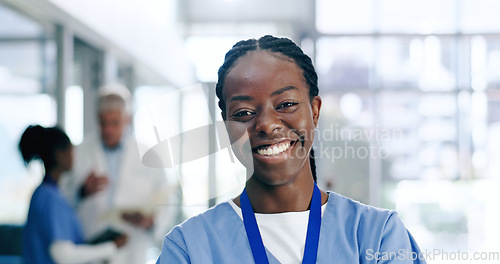 Image of Nurse, woman and portrait with smile in hospital or clinic for healthcare, service or medical support. Medicine, black person and professional with happy, confident and pride for career or wellness