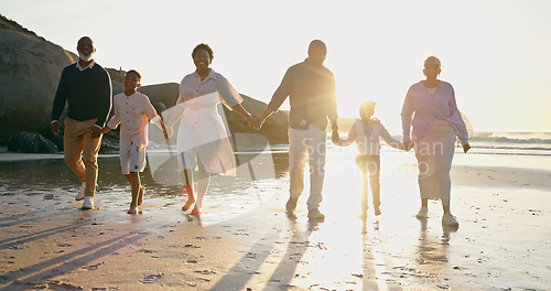 Image of Family, fun and holding hands at beach, support and unity or trust, ocean and solidarity or care. Happy black people, sea and love or joy, bonding or water on vacation, holiday and laughing at sunset