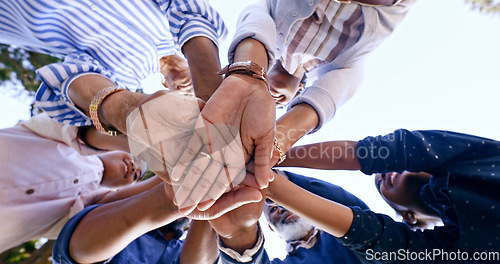 Image of Support, huddle or hands of family in nature for fun bonding or playing in outdoor park together. Love, low angle or mother with grandparents, dad or African kids with solidarity on holiday vacation