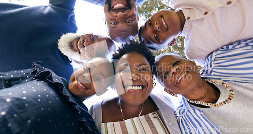 Image of Happy, huddle or portrait of a black family in nature for fun bonding or playing in a park together. Smile, support or below of mother with grandparents, father or children to hug or relax on holiday