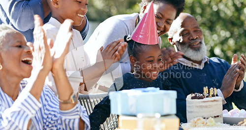 Image of Child, grandparents or black family in backyard for a happy birthday, celebration or growth together. Smile, clapping or excited African people with cake, love or kids in a fun party, nature or park