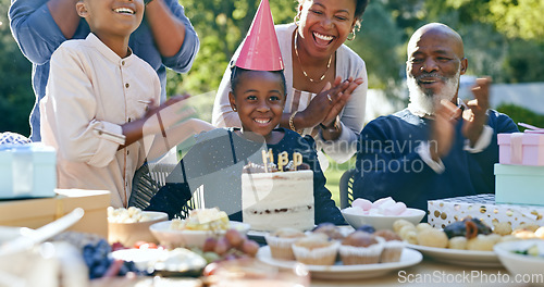 Image of Family, birthday and applause at party with cake, celebration and excited or smile together in home. African parents, kids and clapping at event table outdoor with food, dessert and congratulations