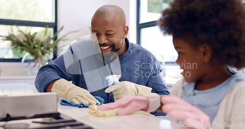 Image of Father, daughter and cleaning with gloves in kitchen for bonding, happiness and teaching in home or house. Black family, man and girl child with cloth, liquid detergent and table with smile and care