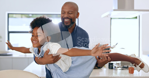 Image of Child, father and happy with airplane game in kitchen, freedom and fun with love bonding in home. Black family, playing or fantasy flying with arms in air, young daughter or trust together in house