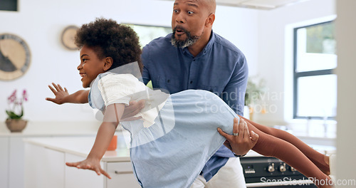 Image of Child, dad and happy with airplane game in kitchen, freedom and fun with love bonding in home. Black family, playing and fantasy flying with arms in air, young daughter and trust together in house