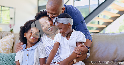 Image of Happy family, children and hug on sofa in living room for bond, embrace and together. Black man, woman and girl with laugh for funny joke, story or memory with love, care and relationship in home