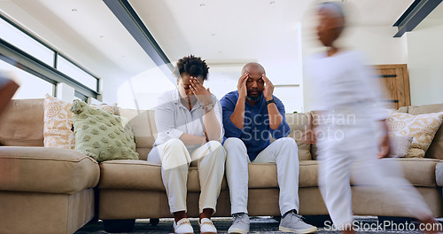Image of Running child, tired parents and headache on a sofa with stress, anxiety or fatigue at home. Family, chaos and frustrated people in a living room with hyper kid, burnout or overwhelmed by adhd energy