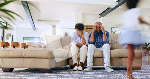 Image of Running kid, tired parents and headache on a sofa with stress, anxiety or fatigue at home. Family, noise and frustrated people in a living room with hyper child, burnout or overwhelmed by adhd energy