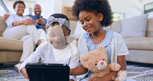 Image of Happy family, kids and tablet on floor watching cartoons, parents and living room couch. Internet, relaxing and streaming while bonding together as siblings, technology and childhood memories