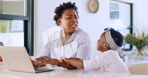 Image of Mother, daughter and laptop or annoyed in home with remote work, email or research on kitchen counter. Black family, woman or frustrated with girl child for attention and noise in apartment or house