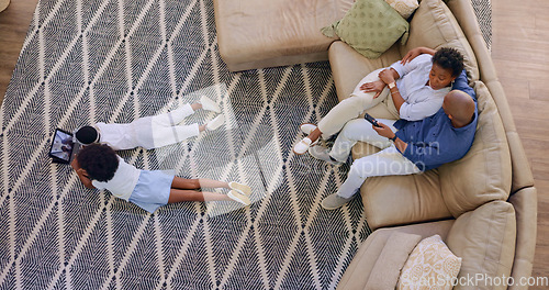 Image of Family, living room and relax in home, top view and screen time for weekend, indoors and enjoy. Parents, children and tablet on floor watching cartoons, streaming and bonding together as siblings