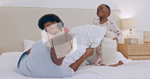 Image of Bedroom, pillow fight and black family father, happy kids or people bonding, fun and papa playing with young youth. Home, games and African children, dad and girl energy, morning and excited on bed