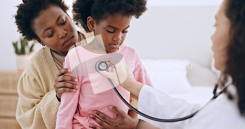 Image of Doctor, little girl and stethoscope for examination in home for health, respiratory system and wellness. Mother, kid and support with paediatrician for listen to heart, lungs or breathing for problem