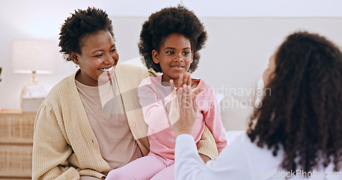 Image of Mother, daughter or doctor and high five or happiness in bedroom with support, trust and healthcare. Black family, women or pediatrician with success or smile for wellness and health results