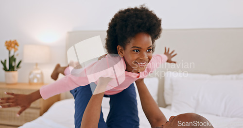 Image of Bedroom, airplane and happy black family, child and dad playing, having fun and enjoy flying game at home. Bed, love and African papa support, bond or lift kid, girl or daughter imagine plane flight