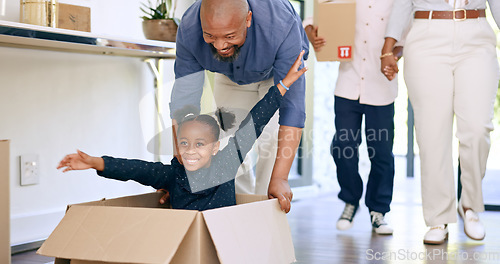 Image of Black family, new home and push in box, smile and together in apartment or house. Girl, father and kid play in cardboard game, happy and real estate loan, moving and celebrate mortgage in property