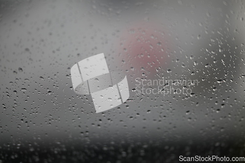 Image of Water drops on fogged glass with a gray brightness gradient