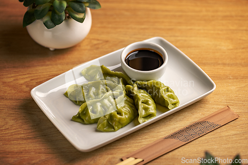 Image of Platter of steamed Chinese spinach filling dumplings