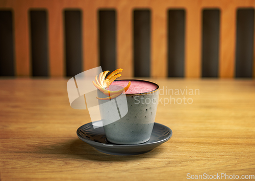 Image of Strawberry latte with orange peel