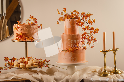 Image of Tall peach colored wedding cake
