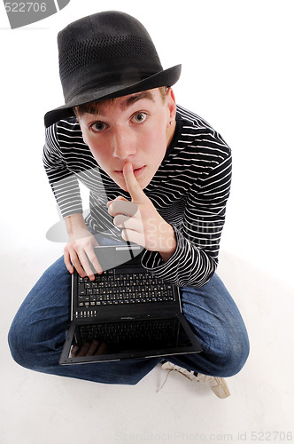 Image of Young man with hat