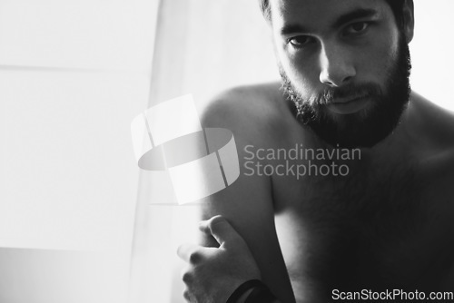Image of Man, bedroom and portrait with thinking and stress with black and white and beard at home. Art and male model in a house with a problem and anxiety with lonely grief and monochrome and mockup space