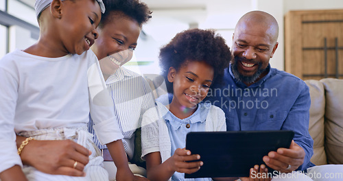 Image of Black family, parents or children with tablet and smile on sofa for games, streaming or elearning in living room of home. People, man and women or touchscreen, happy or technology for watching movie