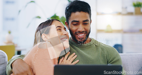 Image of Couple, relax or smile with laptop on sofa to watch movies, subscription show or web download at home. Happy man, interracial woman and computer for online shopping, social media or digital streaming