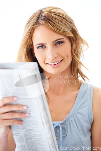 Image of Woman, reading and newspaper with smile, studio or update for global sports, financial index and info. Girl, paper and happy for international news, headline and story with idea by white background