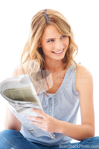 Image of Woman, reading and happy with newspaper, studio or update for global sports, financial index and info. Girl, paper and smile for international news, crossword or story with idea by white background