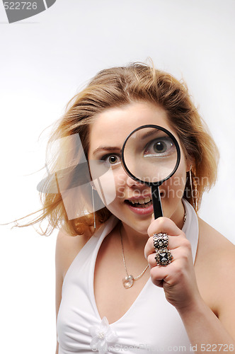 Image of Young pretty girl with handglass