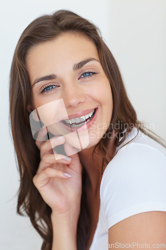 Image of Portrait, smile and skincare with a young woman in studio on a white background for natural dermatology. Face, aesthetic or beauty and a happy person looking confident with her antiaging skin routine