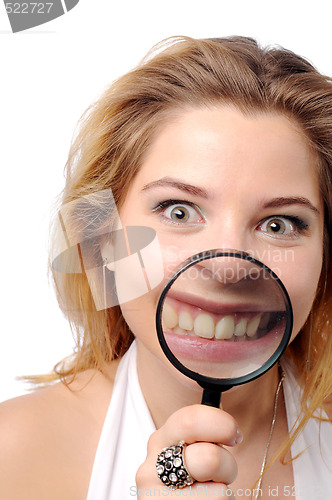 Image of Young pretty girl with handglass