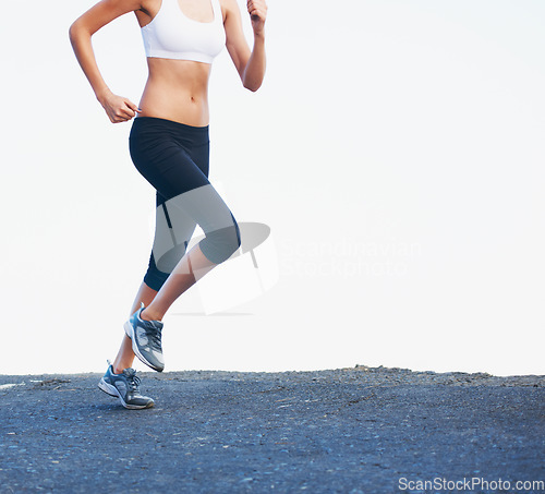 Image of Legs, running and mockup of woman with exercise, fitness and space outdoor on asphalt and training for marathon. Runner, workout and shoes of athlete on road with sky, health and wellness from cardio