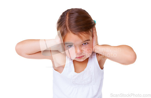 Image of Portrait, loud and covering ears with a girl child in studio isolated on a white background to stop noise. Face, stress or sound with an unhappy young kid using her hands to block hearing for silence