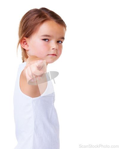 Image of Portrait, vote and pointing with a serious child in studio isolated on a white background for choice. Kids, blame or accuse and a young girl with a gesture for decision or option on vertical space