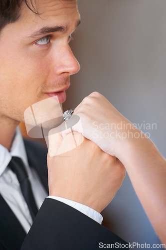 Image of Man, face and hand at wedding ceremony, event and union for loyalty, trust or commitment. People, couple or groom with rings for love, partnership or celebration kiss for marriage, romance or promise