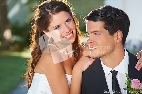 Image of Couple, wedding and together with smile, portrait and memory for commitment to relationship in summer. Man, woman and happy for marriage, event and celebration with fresh start in sunshine with love