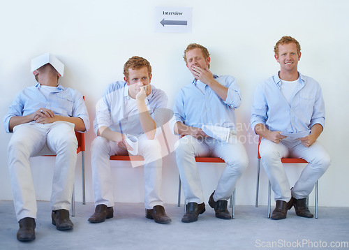 Image of Bored, man and waiting room for interview in office for job, recruitment and sitting with resume and cv. Employee, yawn and fatigue in onboarding process with tired person in human resources