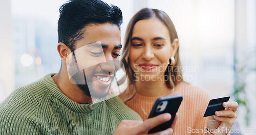 Image of Love, phone and couple with credit card in a house for loan, payment or savings, budget or growth. Home, investment and people with smartphone for online shopping, sale or ecommerce, app and sign up