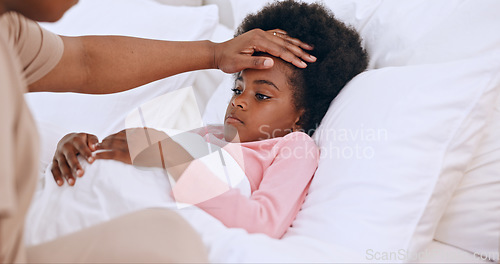 Image of Hands check sick child in bedroom, temperature and covid allergies in family home. Parent, closeup and kid with fever in bed, touch forehead and care for girl with cold, virus and bacteria disease