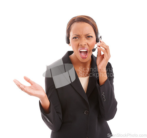 Image of Frustrated black woman, call center and headphones shouting at difficult customer against a white studio background. African female person, consultant or agent screaming or yelling on headset mic