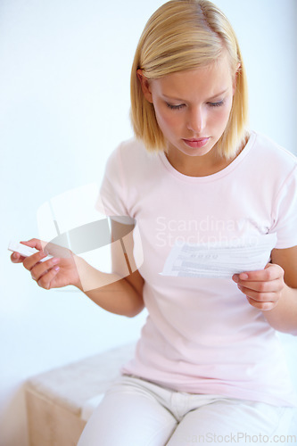 Image of Reading, instructions and woman with pregnancy test in bathroom waiting for results, news and information. Motherhood, pregnant and person with medical testing kit for fertility or ovulation at home